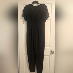 Beautiful Black Jumpsuit! You can dress it up or down! I wore it once.